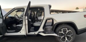 White Rivian R1T EV pickup truck rental car for rent in Scottsdale, Arizona.